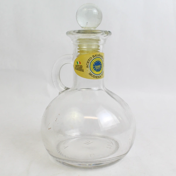 Empty Clear Glass Bottle Of Aceto Balsamico Di Modena Igp Decor