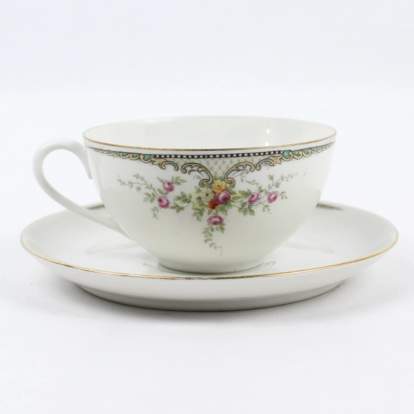 Lot of 4 Hutschenreuther Cups And 5 Saucers White With Pink Flowers Bavaria