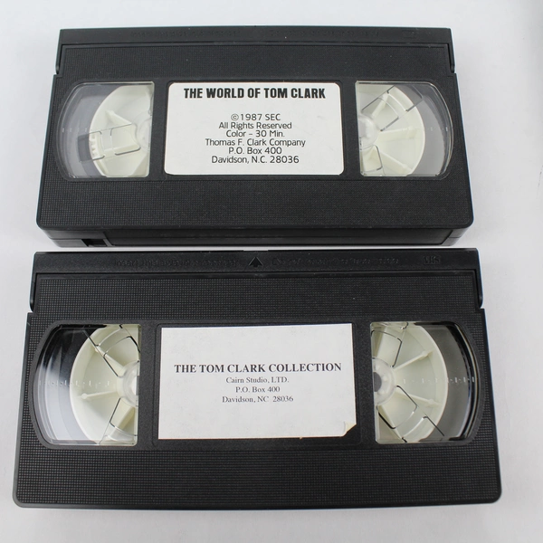 Lot of 2 Tom Clark VHS Tapes with Original Boxes - 1987 & 1992