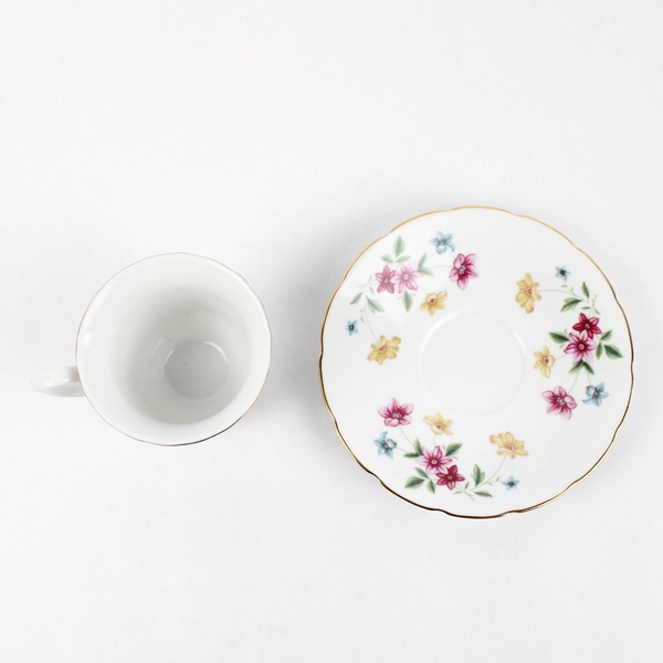 Vtg H 9 Porcelain Tea cup and Saucer Made In China White With Floral Pattern