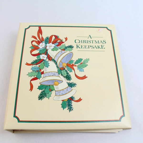 A Christmas Keepsake Hallmark Binder With Carols Stickers and Folders Vintage