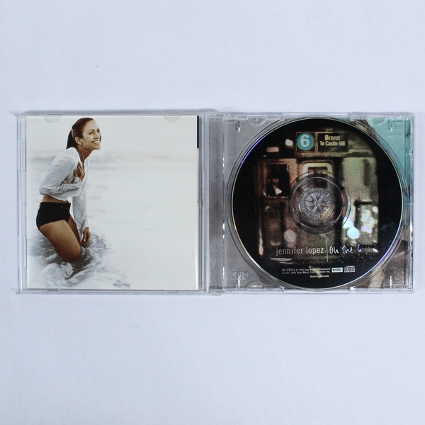 Jennifer Lopez On the 6 CD 1999 Pre-Owned Album with Hits - Scratched Case