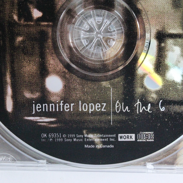 Jennifer Lopez On the 6 CD 1999 Pre-Owned Album with Hits - Scratched Case