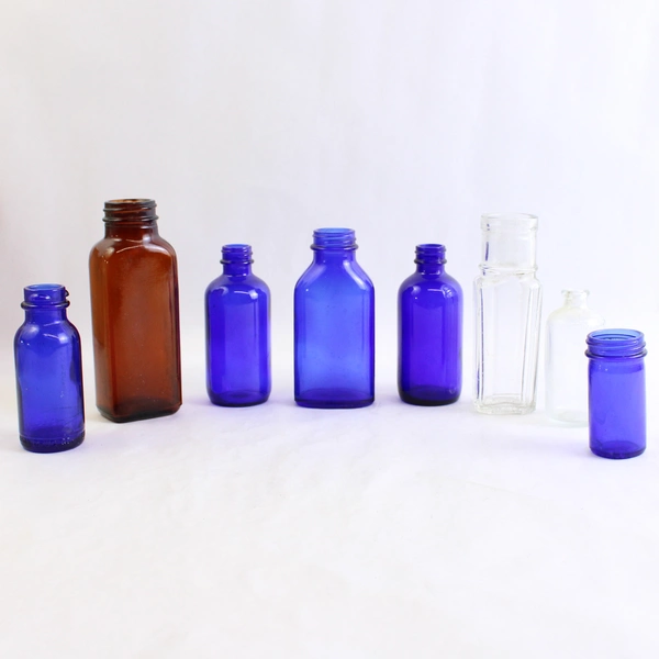 Lot of 8 Vintage Brown Blue Clear Apothecary Medicine & Condiment Bottles