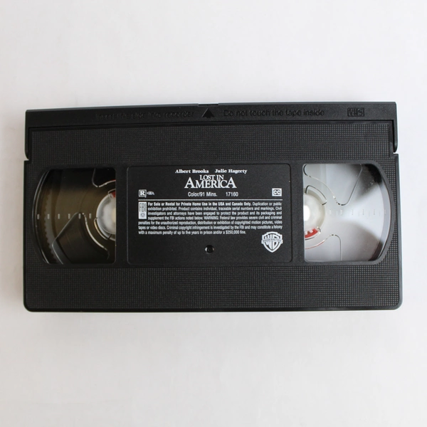 Lost in America VHS Film by Warner Bros 1999 Albert Brooks and Julie Hagerty