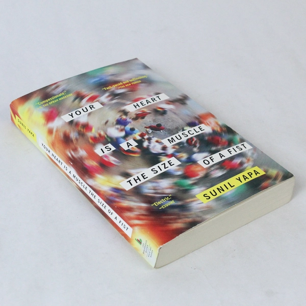 Your Heart Is A Muscle the Size of A Fist by Sunil Yapa 2016 Paperback