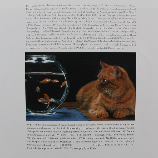 Cats by Seymour Simon 2004 Scholastic Paperback - Good Pre-Owned, Torn Cover