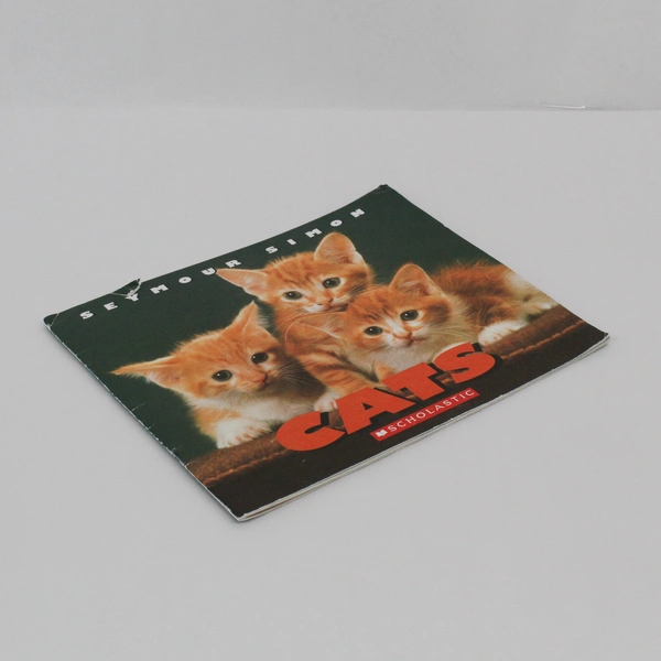 Cats by Seymour Simon 2004 Scholastic Paperback - Good Pre-Owned, Torn Cover