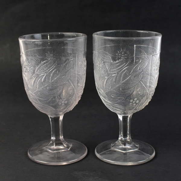 Set of 2 Unmarked EAPG Windflower Pattern Clear Glass Goblets