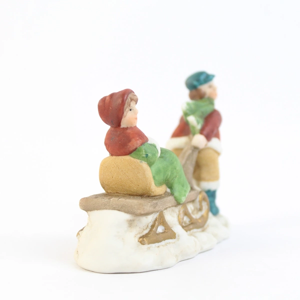 Russ Porcelain Figurine A Victorian Christmas  Boy Pulling Sleighs w/ Girl 9702