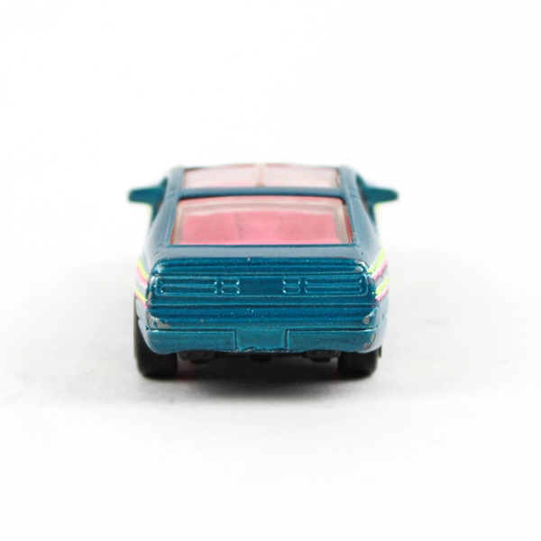 1990 Matchbox Nissan 300ZX Diecast Car Teal Pink Yellow Stripes Retro
