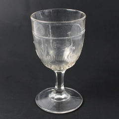 EAPG Moon and Stork Pattern Clear Embossed Glass Goblet 5.75" Flawed