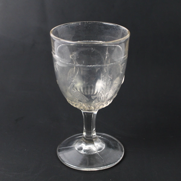 EAPG Moon and Stork Pattern Clear Embossed Glass Goblet 5.75" Flawed