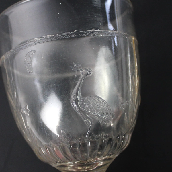 EAPG Moon and Stork Pattern Clear Embossed Glass Goblet 5.75" Flawed