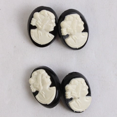 Set of 4 Cameo Shank Buttons Black White Plastic Oval 0.75"