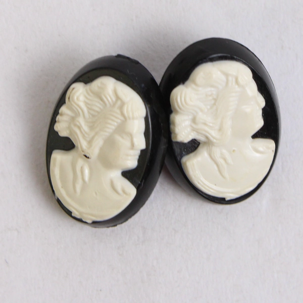 Set of 4 Cameo Shank Buttons Black White Plastic Oval 0.75"