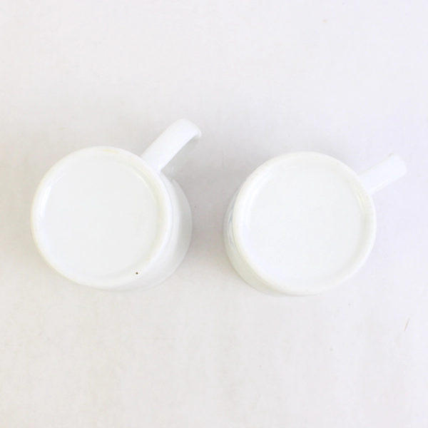 Set of 2 White Textured Ceramic Coffee Mugs Embossed Pink Flowers Blue Leaves