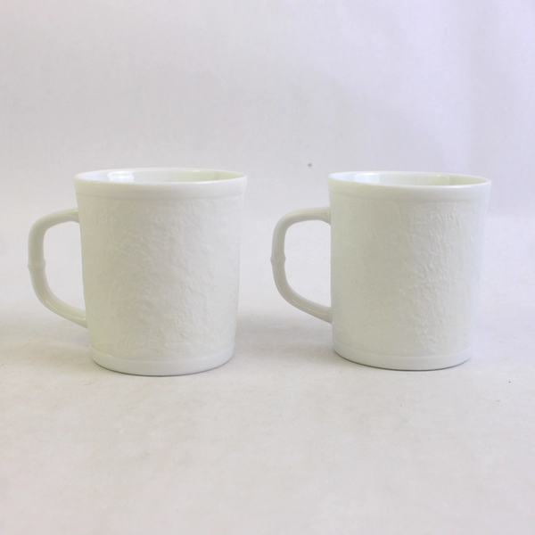 Set of 2 White Textured Ceramic Coffee Mugs Embossed Pink Flowers Blue Leaves