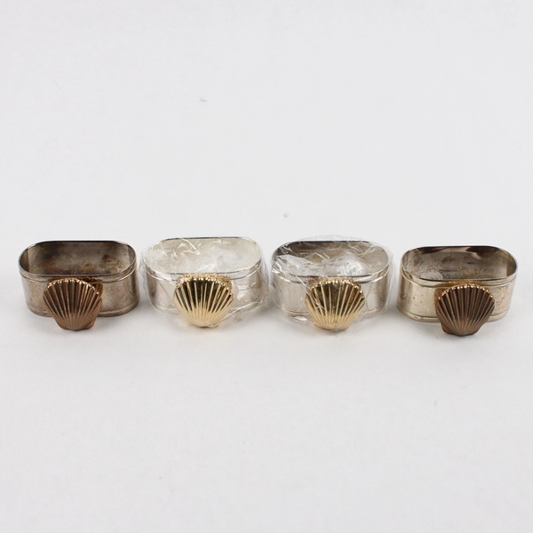 Set of 4 Silverplated Napkin Rings With A Brass Seashell