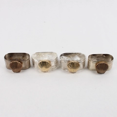 Set of 4 Silverplated Napkin Rings With A Brass Seashell