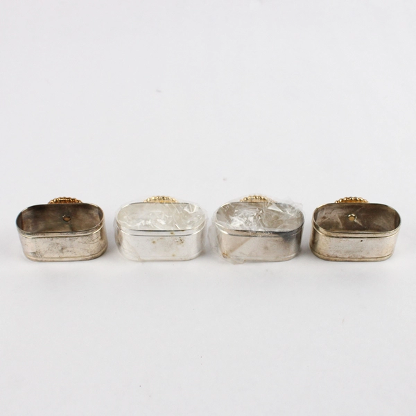 Set of 4 Silverplated Napkin Rings With A Brass Seashell