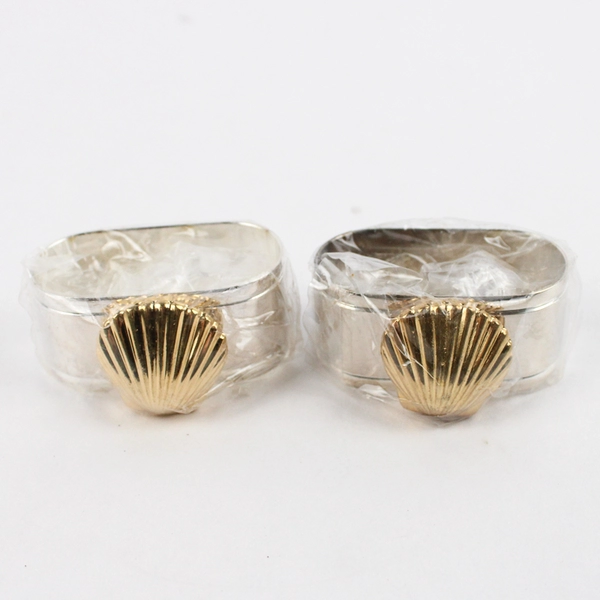 Set of 4 Silverplated Napkin Rings With A Brass Seashell