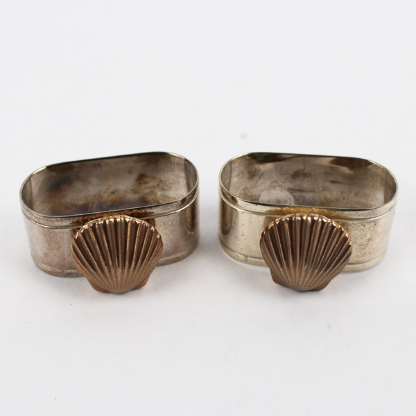 Set of 4 Silverplated Napkin Rings With A Brass Seashell