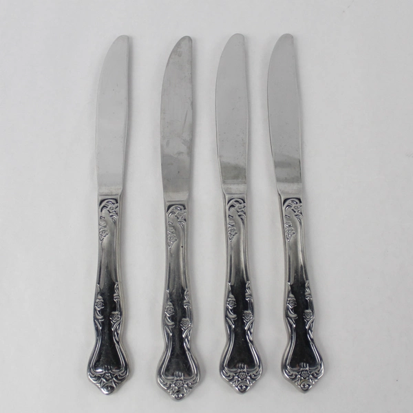 Lot of 4 Oneida Stainless Steel Dinner Knives Floral Art Deco Style