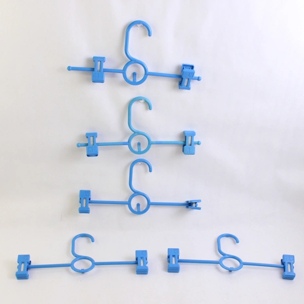 Lot of 5 Blue Plastic Clothes Hangers With Clips