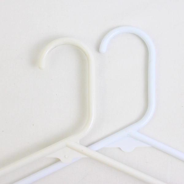 Lot of 10 Various Tubular Off-White Hangers Plastic With Hooks White and Tan