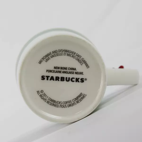 2011 Starbucks Winter Scene Mug Cup Red Airplane Handle Ice Skating Sled Flawed