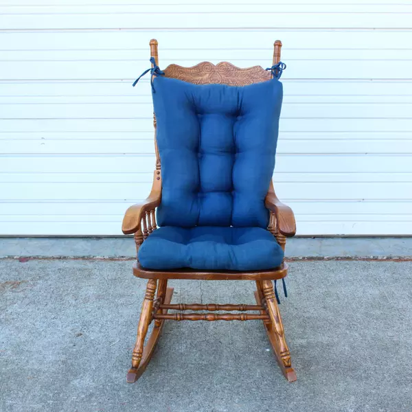 Solid Wood Carved Rocking Chair with Dark Blue Cushioned Support Pads