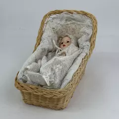Vintage Sankyo 9 Inch Porcelain and Cloth Baby Doll With Bassinet