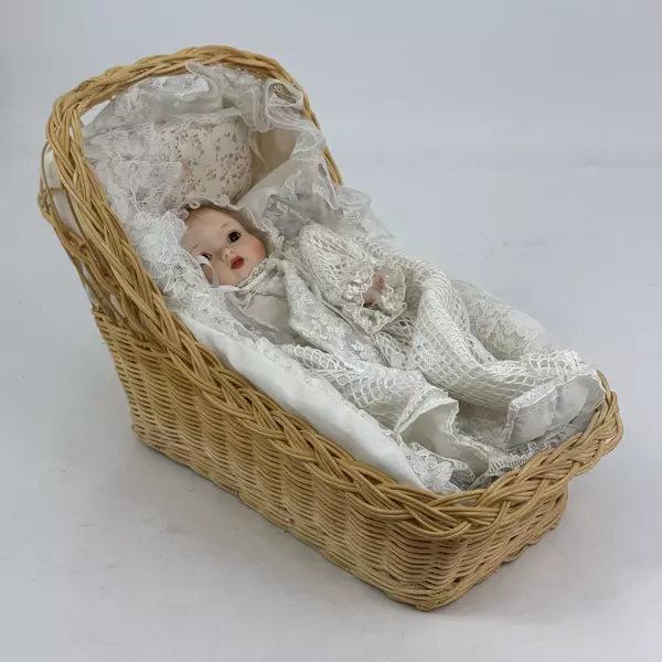 Vintage Sankyo 9 Inch Porcelain and Cloth Baby Doll With Bassinet
