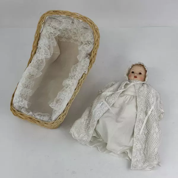 Vintage Sankyo 9 Inch Porcelain and Cloth Baby Doll With Bassinet