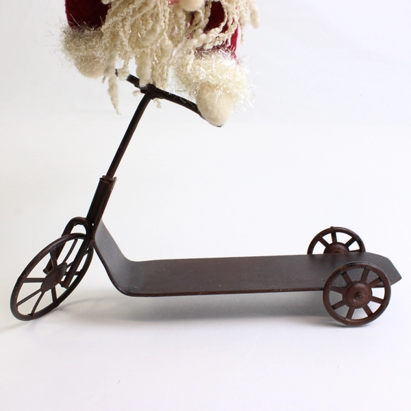 Santa Clause on a Scooter Doll Holiday Decor Figurine 10"