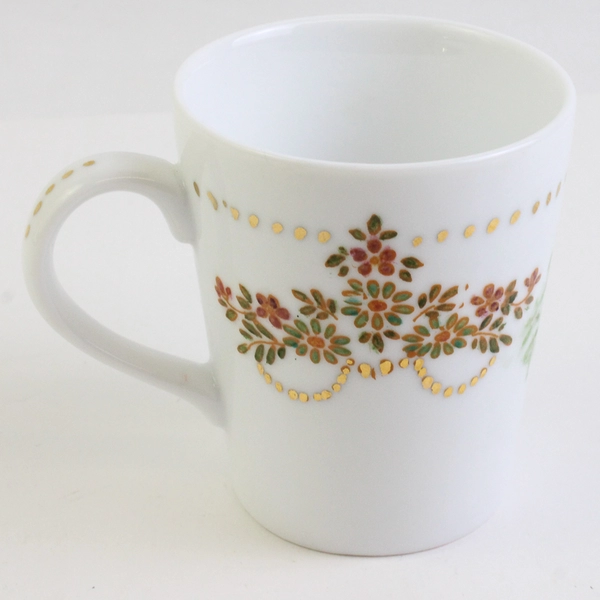 Handmade Ceramic Mug with Bird and Foliage Details