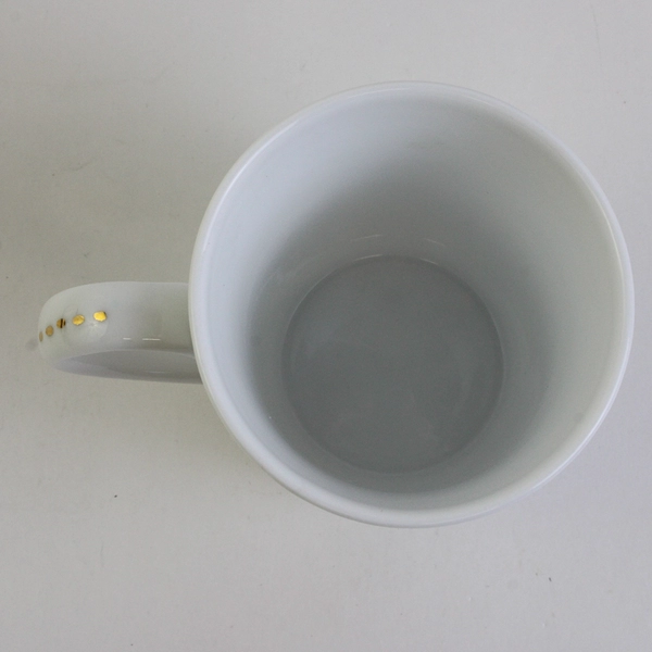Handmade Ceramic Mug with Bird and Foliage Details