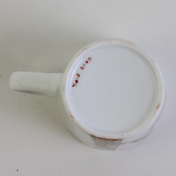 Handmade Ceramic Mug with Bird and Foliage Details