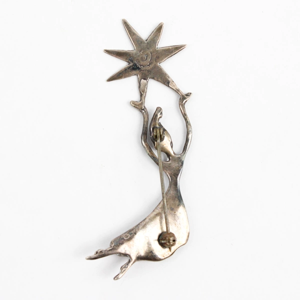 Silver Metal Brooch with Woman Holding a Star