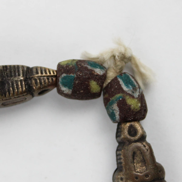 Bronze Toned Beaded Necklace with Decorative Medallion Pendant