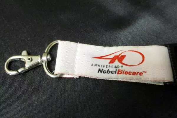 Lot of 2 Nobel Biocare 40th Anniversary Lanyards Key Chains 2005 Pink