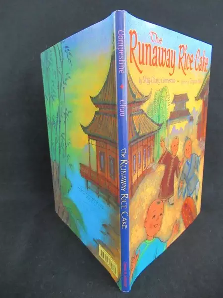 The Runaway Rice Cake by Ying Chang Compestine HCDJ 2001 - Good Condition