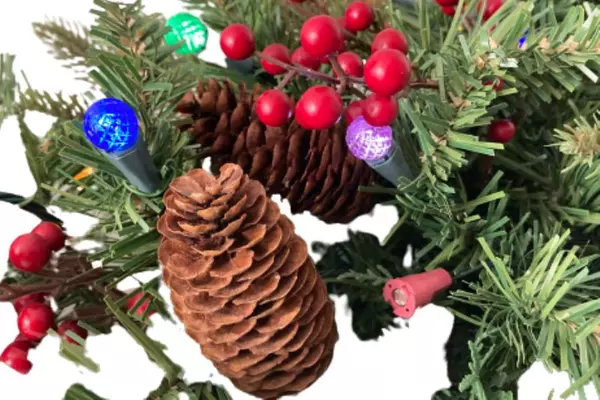 Pre-Lit Artificial Pine Wall Swag 21" with Pinecones, Berries & Lights