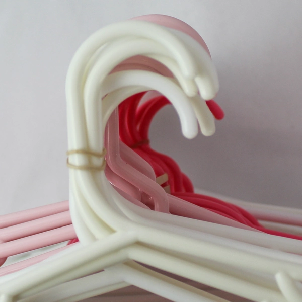 Lot of 50 Assorted Children's Plastic Hangers Pink & White 7" x 11.75"