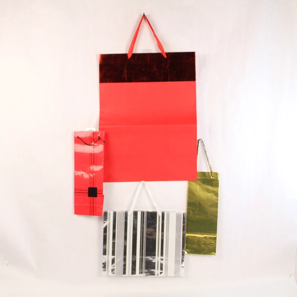 Lot of 4 American Greetings Jumbo & Medium Christmas Gift Bags, Good Condition