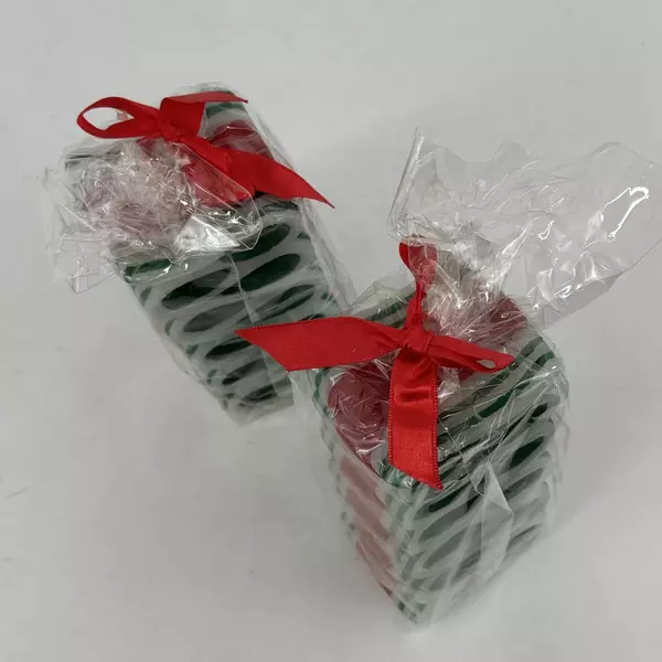 Lot of 2 Red White And Green Striped Ribbon Candy Christmas Candles