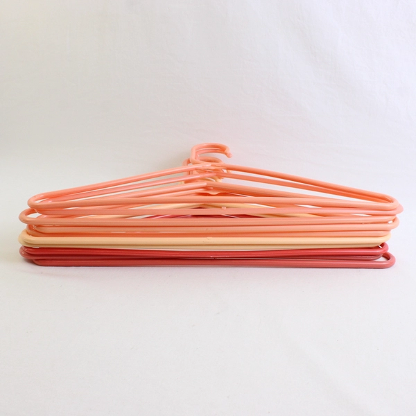Lot of 10 Salmon Color Plastic Tubular Hangers