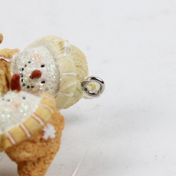 Russ Berrie and Co. "Frost Smitten" Snowman and Snowgirl Ice Skating Ornament