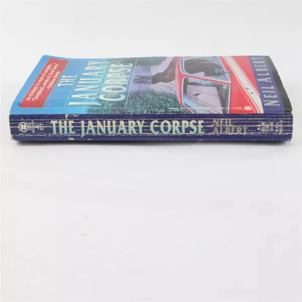 The January Corpse by Neil Albert Mass Market Paperback